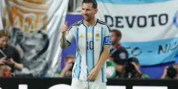 Lionel Messi celebrates his historic World Cup hat-trick