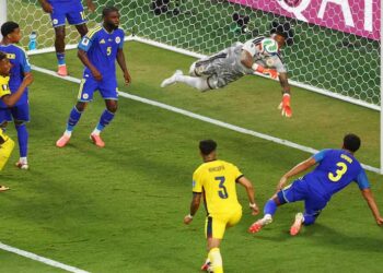 Curacao goalkeeper Eloy Room in action during a World Cup Group E match against Ecuador.