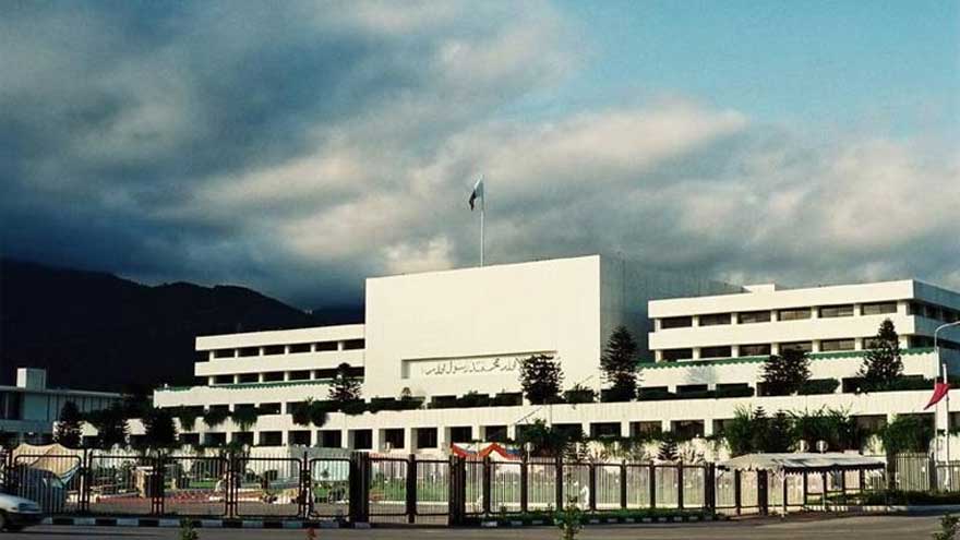 Pakistani lawmakers voting in National Assembly during approval of federal budget allocations.