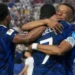 Kylian Mbappe celebrating a goal for France during a World Cup match delayed by storm at Lincoln Financial Field