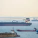 Large crude oil tankers operating in the Gulf near the Strait of Hormuz amid rising freight rates