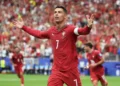 Cristiano Ronaldo celebrating a goal for Portugal in a FIFA World Cup match against Uzbekistan