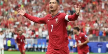 Cristiano Ronaldo celebrating a goal for Portugal in a FIFA World Cup match against Uzbekistan