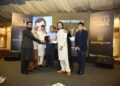 Celebratory event in Karachi hosted by Sirajia Group with guests from entertainment and business sectors.