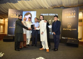 Celebratory event in Karachi hosted by Sirajia Group with guests from entertainment and business sectors.