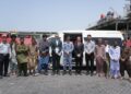 Pakistan Maritime Security Agency staff assisting rescued Iranian nationals during repatriation process in Karachi.