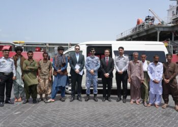 Pakistan Maritime Security Agency staff assisting rescued Iranian nationals during repatriation process in Karachi.