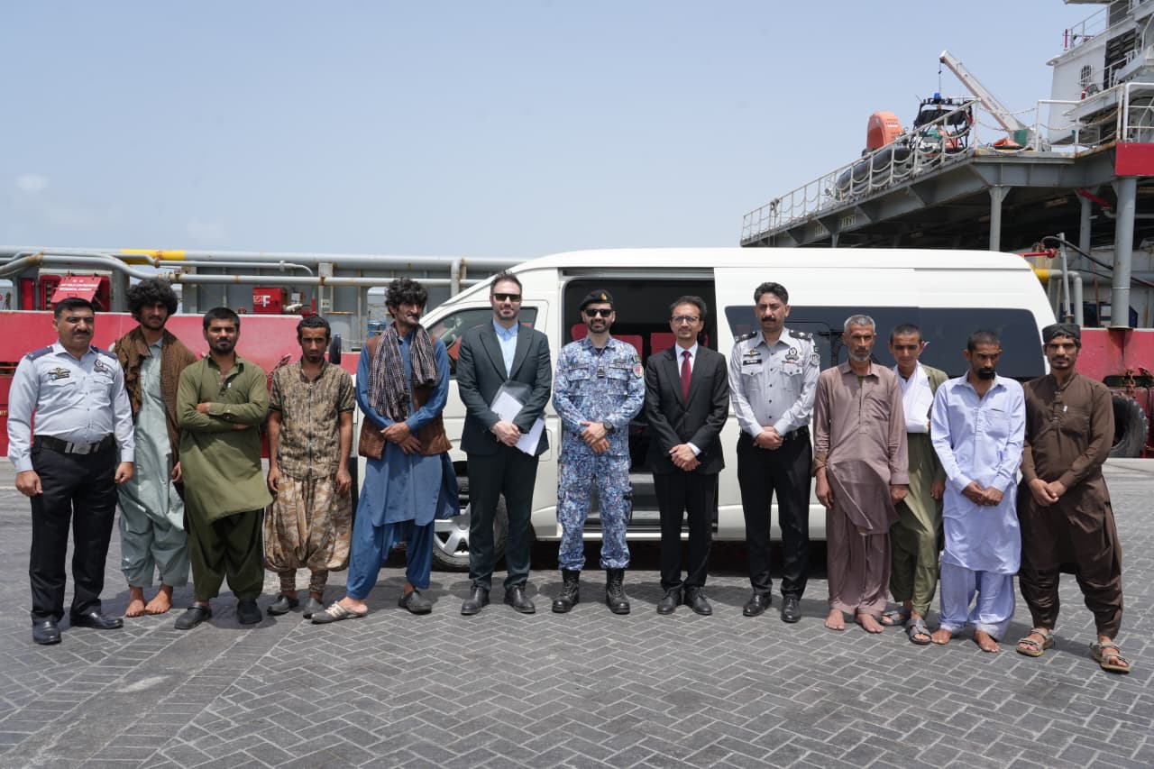 Pakistan Maritime Security Agency staff assisting rescued Iranian nationals during repatriation process in Karachi.