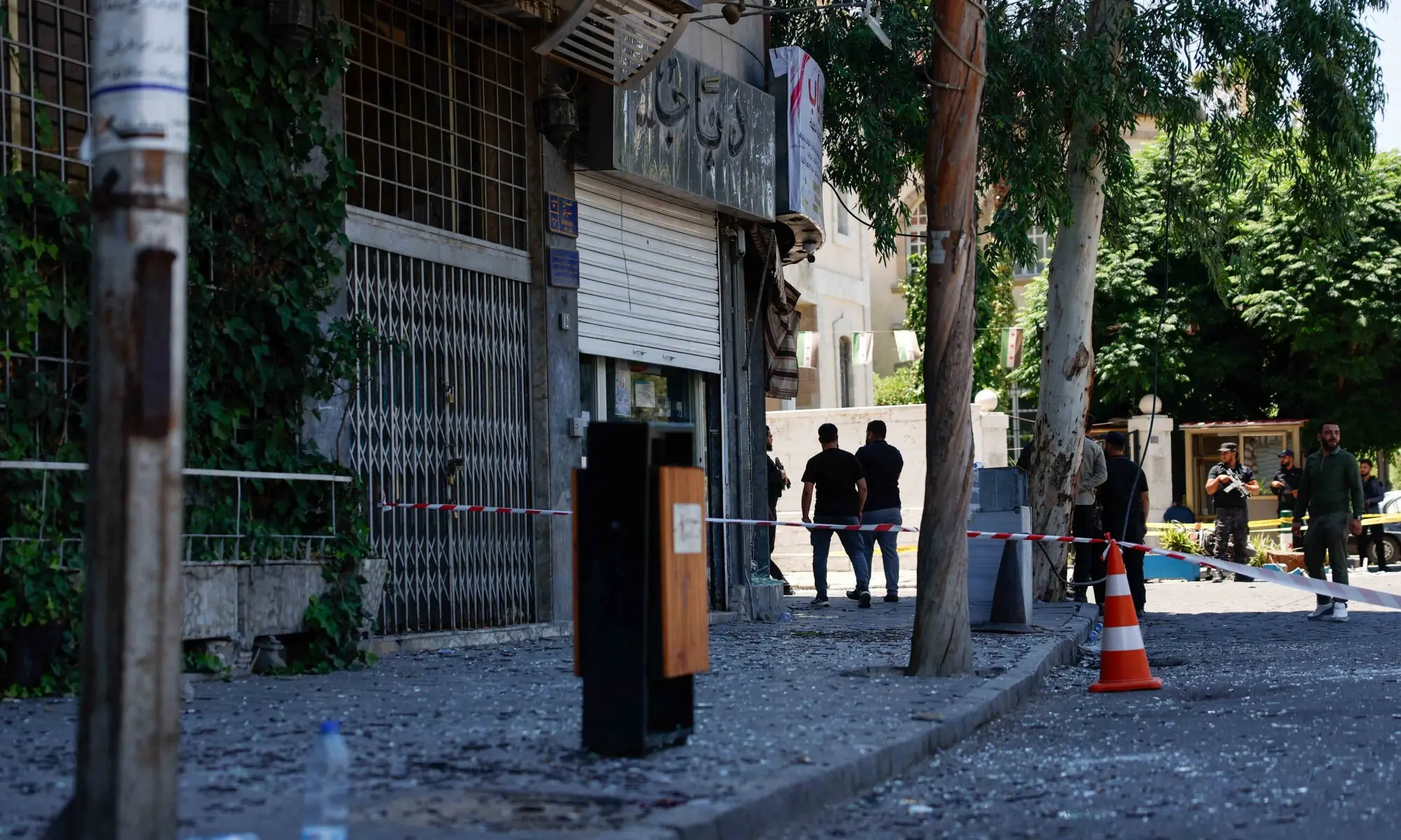 Smoke rises near the Four Seasons Hotel in Damascus after explosions during Emmanuel Macron's visit to Syria.