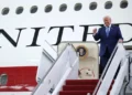 US President Donald Trump stands beside the Qatar-donated Boeing 747 designated as a temporary Air Force One aircraft.