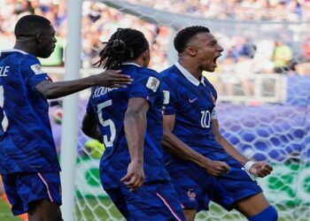 France forward Kylian Mbappé celebrates after converting a penalty against Paraguay in the FIFA World Cup.