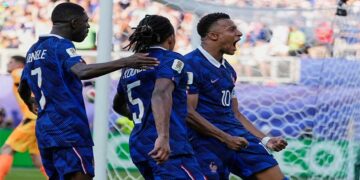 France forward Kylian Mbappé celebrates after converting a penalty against Paraguay in the FIFA World Cup.