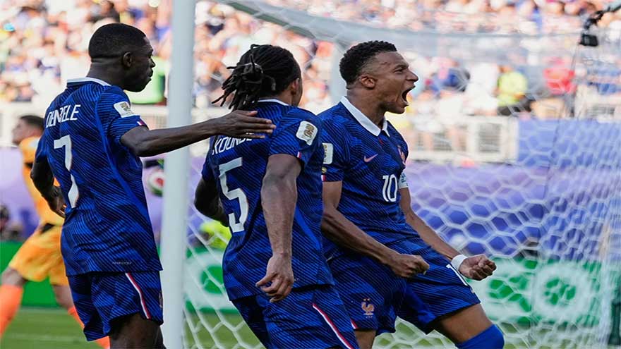 France forward Kylian Mbappé celebrates after converting a penalty against Paraguay in the FIFA World Cup.