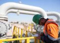 Oil facilities in Iraq following cabinet approval for strategic pipeline feasibility studies.