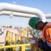 Oil facilities in Iraq following cabinet approval for strategic pipeline feasibility studies.