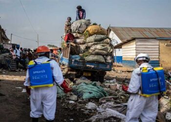 Medical staff wearing protective equipment at an Ebola treatment centre in Bunia during the Congo outbreak.