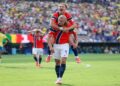 Erling Haaland celebrates during Norway's 2-1 World Cup win against Brazil at MetLife Stadium.