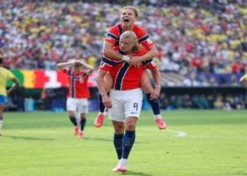Erling Haaland celebrates during Norway's 2-1 World Cup win against Brazil at MetLife Stadium.