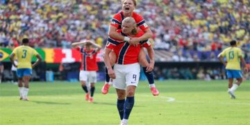 Erling Haaland celebrates during Norway's 2-1 World Cup win against Brazil at MetLife Stadium.