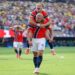 Erling Haaland celebrates during Norway's 2-1 World Cup win against Brazil at MetLife Stadium.