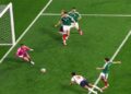 Jude Bellingham celebrates during England's 3-2 World Cup victory against Mexico at the Azteca Stadium.