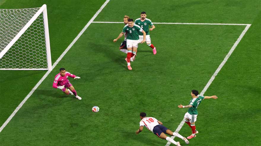 Jude Bellingham celebrates during England's 3-2 World Cup victory against Mexico at the Azteca Stadium.