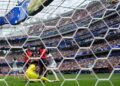 Spain midfielder Mikel Merino celebrates after scoring the winning goal against Belgium in the FIFA World Cup quarter-final.