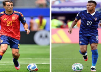 France and Spain players competing for a place in the FIFA World Cup final.