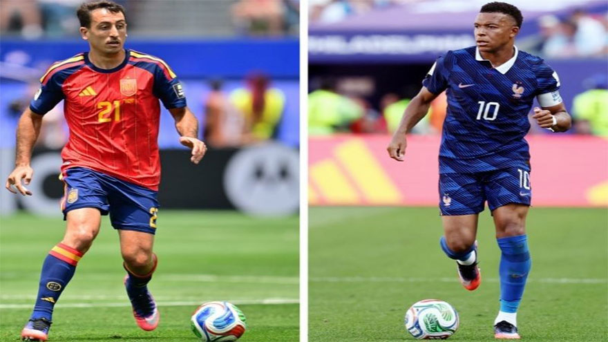 France and Spain players competing for a place in the FIFA World Cup final.
