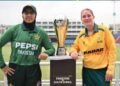 Pakistan U-19 and South Africa U-19 women's cricket captains pose with the T20 series trophy before the opening match in Karachi.