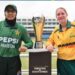Pakistan U-19 and South Africa U-19 women's cricket captains pose with the T20 series trophy before the opening match in Karachi.
