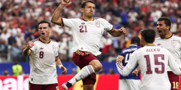 Spain players celebrate their 2-0 victory over France in the FIFA World Cup semi-final.