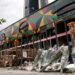 Emergency responders outside the Rong Beer Na Lat Phrao pub after the deadly fire in Bangkok.