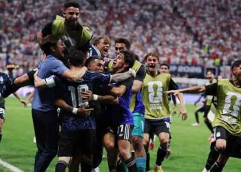 Argentina players celebrate victory over England after reaching the World Cup final with a dramatic 2-1 comeback.