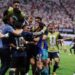 Argentina players celebrate victory over England after reaching the World Cup final with a dramatic 2-1 comeback.