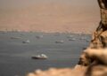 Oil tanker transits the Strait of Hormuz amid heightened US-Iran tensions and concerns over global energy supplies.