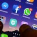 Facebook and Instagram logos displayed on a smartphone during a reported Meta service outage.