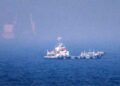 Commercial tanker navigating the Strait of Hormuz during escalating conflict between Iran and the United States.