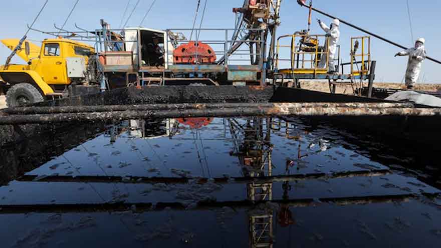 Oil barrels representing Brent crude and WTI prices amid Middle East geopolitical tensions.