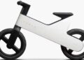 Tesla balance bike designed for children aged two to five with a lightweight magnesium frame.