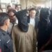 Karachi police officers secure an area during an SIU operation related to the Dr Akash murder case.