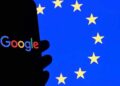 Google logo displayed outside a company office after the European Union announced new antitrust fines.