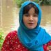 Rabi Pirzada records a video showing rainwater accumulation in Lahore's DHA.