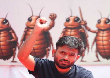 Abhijeet Dipke addresses student protesters during a demonstration in New Delhi.