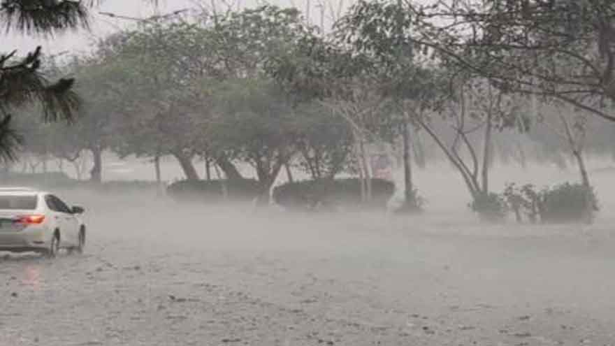 Flooded street in Lahore after overnight monsoon rainfall.