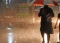Flooded street in Punjab during heavy monsoon rains as emergency authorities issue a fresh weather alert.