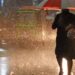 Flooded street in Punjab during heavy monsoon rains as emergency authorities issue a fresh weather alert.