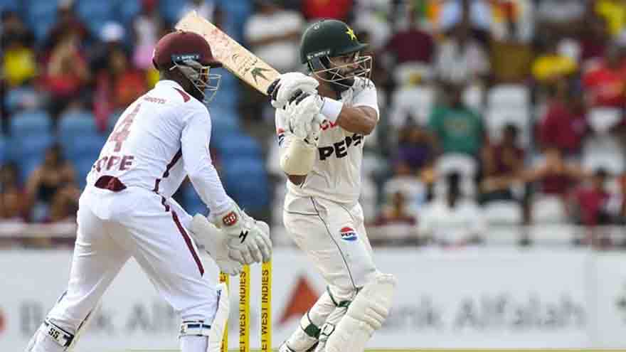 Pakistan batter Shan Masood plays a shot during the first Test against the West Indies at the Brian Lara Cricket Academy.