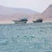 Oil tankers sailing through the Bab el-Mandeb Strait after Houthi attacks disrupted Red Sea shipping routes.