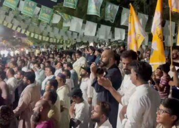 Election staff counting ballot papers during Azad Jammu and Kashmir Legislative Assembly elections.